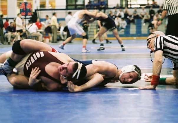 Wrestling mat control